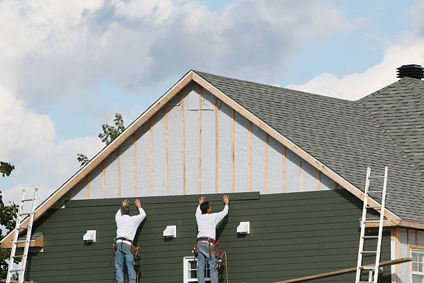 Professional Siding technician working in Fork, MD
